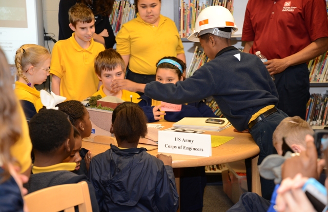 Indian Springs students applying the three questions method Hathorn taught them to rebuild the model. (Photo by Lorraine Sutton Evans)